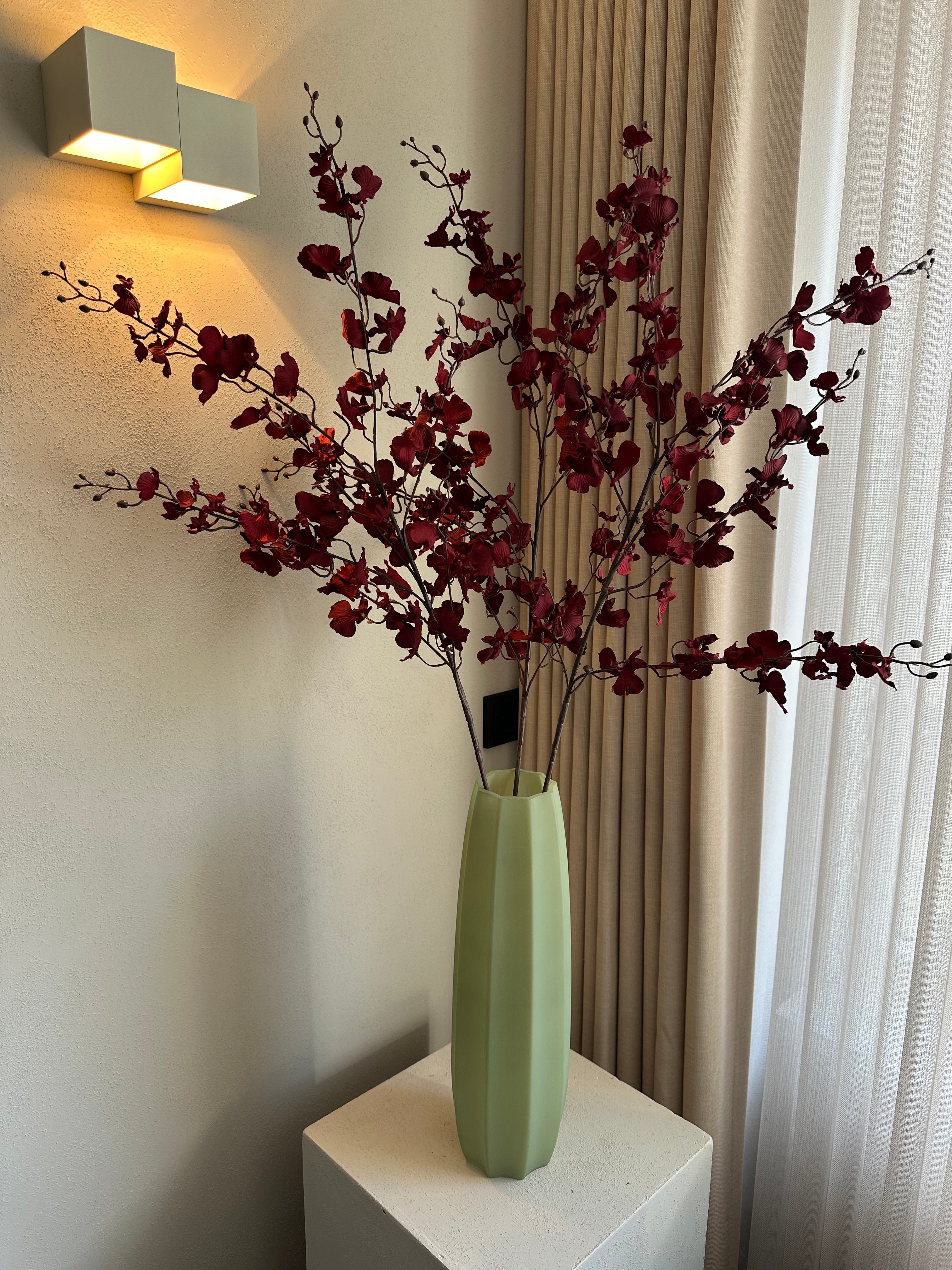 Rode bloemen tak